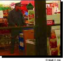 Photograph of officer in a convenience store