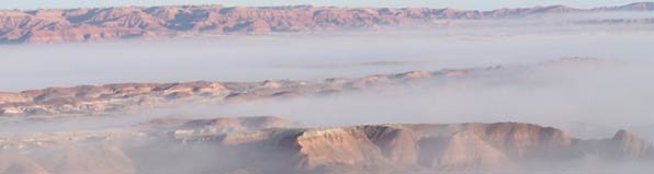 Painted Desert filled with clouds during a temperature inversion, Photo by Marge Post/NPS