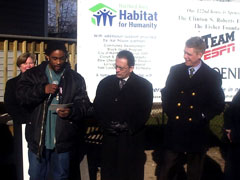 [Photo: YouthBuild trainee Queinton Wolcott tells Mayor Perez and HUD Regional Director how the program has helped turn his life around.]