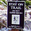 A Saddle Rock Trail warning sign