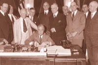 On June 16, 1933, President Franklin Roosevelt signed the Banking Act of 1933, a part of which established the FDIC.  