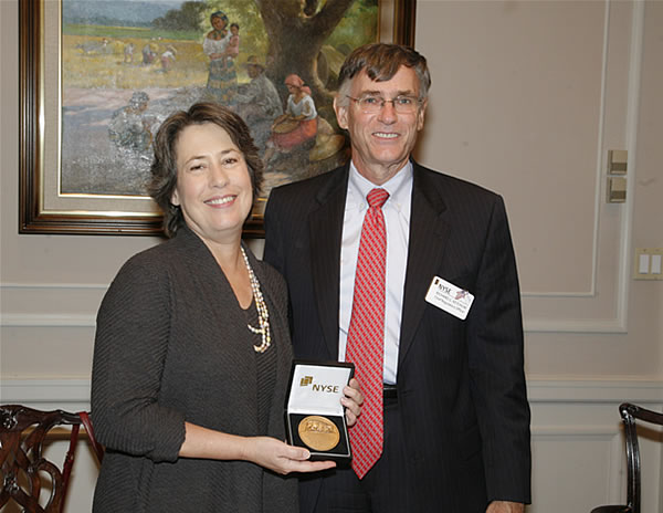 NYSE Chief Regulatory Officer Richard Ketchum presents FDIC Chairman Bair with a gift. 
