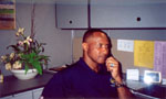 Lynn Swann on the phone as a featured guest on "Ask the White House," an online interactive forum.