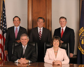 The FDIC Board of Directors (standing from left to right): John C. Dugan, the Comptroller of the Currency; Thomas J. Curry, FDIC; John M. Reich Director of the Office of Thrift Supervision (OTS); (seated) Martin Gruenberg, Vice Chairman and Chairman Sheila C. Bair