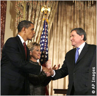 Obama and Holbrooke shake hands as Hillary Clinton applauds (AP Images)