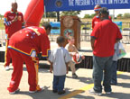 Photo of the Harlem Globetrotters giving kids basketball tips