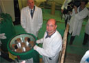 While news cameras film the mission, Dr. Igor Bolshinsky of NNSA’s Office of Defense Nuclear Nonproliferation secures nuclear materials at a Latvian facility.