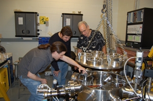 Students and advisor Dr. Richard Petrasso of the MIT Plasma Science and Fusion Center work on the detector proto-type tests