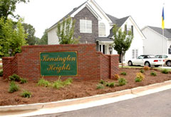 Kensington Heights sign and a new home.