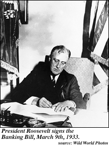 Photo of President Roosevelt signing the Bank Bill on March 9th, 1933.