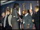 First Lady Michelle Obama greets Cecelia Lewis and other ED employees in the auditorium at the U.S. Department of Education.