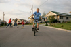 Children play in a Tennessee neighborhood where homes feature energy efficient technologies, resulting in some electric bills reaching less than 50 cents per day. The community was built in a partnership between Department of Energy's Oak Ridge National Lab and Habitat for Humanity.