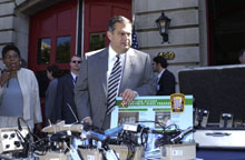 Secretary Abraham with the display of surplus DOE radioation detection equipment