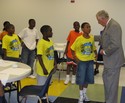  Rep. Hoyer speaks with kids at the YMCA Potomac Overlook.