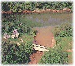 Picture showing highly turbid water from a tributary (where construction was probably taking place) flowing into the less turbid water of the Chattahoochee River