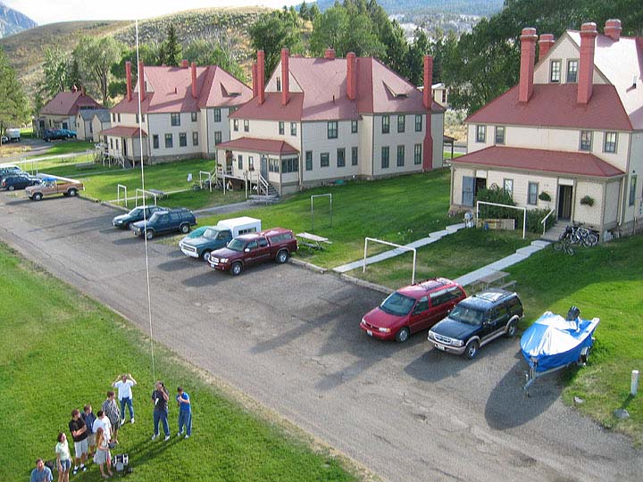 Aerial photo showing the ground crew taking the photos and the duplex residences known as Officers' Row