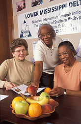 Photo: Delta NIRI Executive Director Margaret Bogle (left) and Cooperators.  Link to photo information