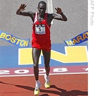 Robert Cheruiyot of Kenya crosses the finish line of the Boston Marathon, 21 April 2008