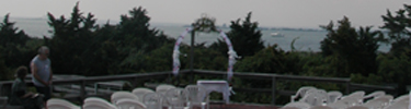 Chairs set up on terrace for special event at Fire Island Lighthouse.