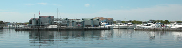 Watch Hill Marina and Visitor Center facilities as seen from water.
