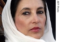 Benazir Bhutto looks on to supporters during campaign rally in Rawalpindhi, 27 Dec 2007