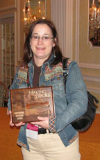 Photograph:  Beth Le Master poses with award.
