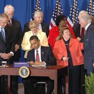 President Obama signs the Edward M. Kennedy Serve America Act on April 21, 2009.