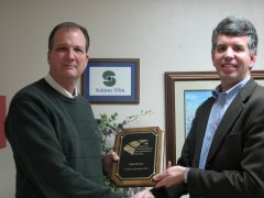 Photo of EPA presenting NPEP award to Schirm USA