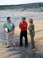 Richard Greene and Texas Chairman Kathleen White tour methane digester.