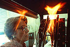 photo of scientist testing flame-resistant fabrics