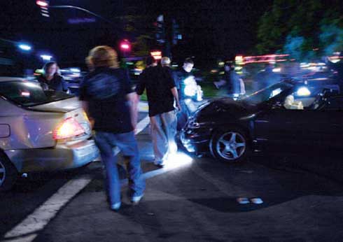 This is a photpgraph of a scene of a traffic accident involving teenagers.