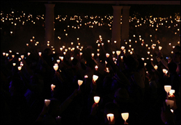 Crowd holding candles at 21st Annual Candlelight Vigil for National Police Week 2009