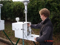 Photo showing the Loading of an Air Sampler. This  links to a larger image.