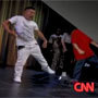 Image still from CNN video of hip hop dancers performing