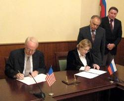 July 6, 2009 - U.S. Ambassador John Beyrle and Deputy Minister of Health and Social Development Veronika Skvortsova of the Russian Federation signing the Memorandum of Understanding on Cooperation in Public Health and Medical Sciences.