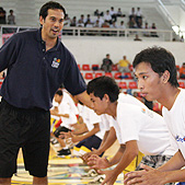 Photo of Erik Spoelstra running the ''Triple Threat'' drill with the local kids of Zamboanga.