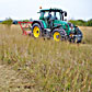 Worker with USAG Bamberg's Environmental Office fights the undesired reed grass (Calamagrostis) at the airfield.