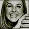 Photo of a young, college-age woman with her hands on a stack of books. She is smiling at the camera. This photo is also a link to the Student's Page.