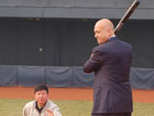 Photo of Mr. Li Gaochao playing catcher for Cal at Wukesong Olympic Baseball Field