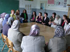 Photo of ECA Alumna Xhane Kreshova conducting a women's health workshop