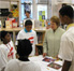 Anne-Imelda Radice,IMLS Director, with students from the Stuart-Hobson Middle School.