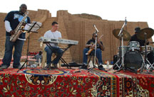 Photo of Alvin Atkinson & The Sound Merchants playing a concert in front of the Great Ziggurat of Ur in Iraq