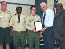 Mayor Ron Loveridge is flanked by Alton Garrett, Southern California Director for Senator Boxer and Scoutmaster Tim Monnig, and scouts Julian Roussell and Zac Brown