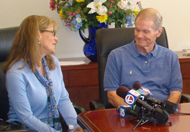 In Miami, Sen. Bill Nelson listens to plea from Lourdes Batista for help. 