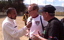 Photo of Sports Envoy scrimmaging with a Bolivian soccer player.