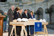 image of Senators Robert Bennett, Dianne Feinstein, Harry Reid, and Speaker of the U.S. House Nancy Pelosi reviewing plans for the inaugural platform