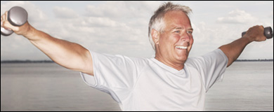 Photo: A man lifting weights for exercise.