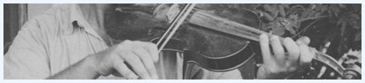 Wayne Perry playing fiddle, Crowley, Louisiana.