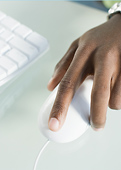 hand on computer mouse