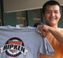 Photo of SportsUnited participant showing off his Ripken shirt